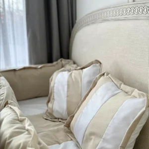 Vestidura para cuna beige con blanco